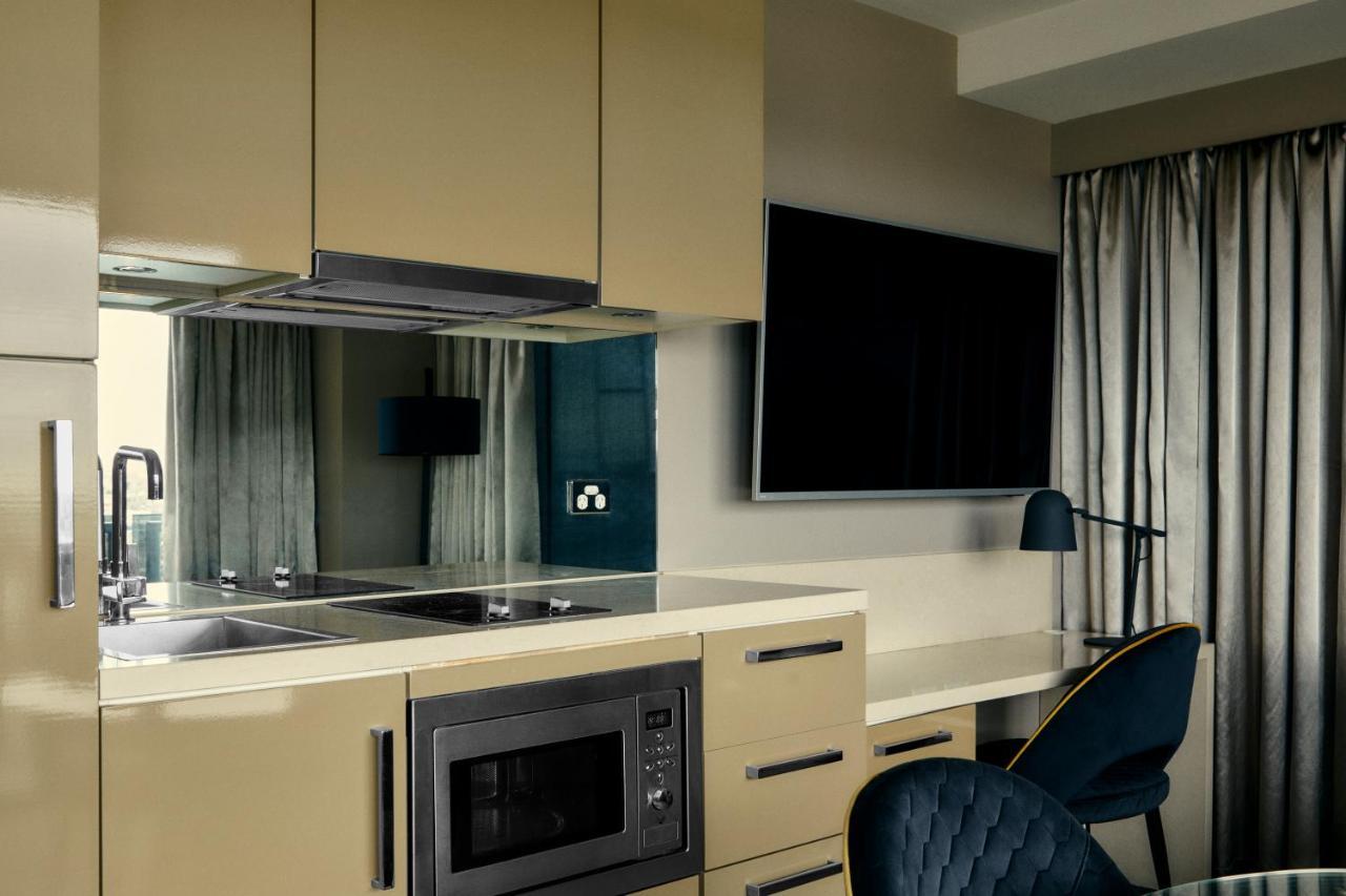 The Kinson Hotel Мелбърн Екстериор снимка A kitchen in a serviced apartment
